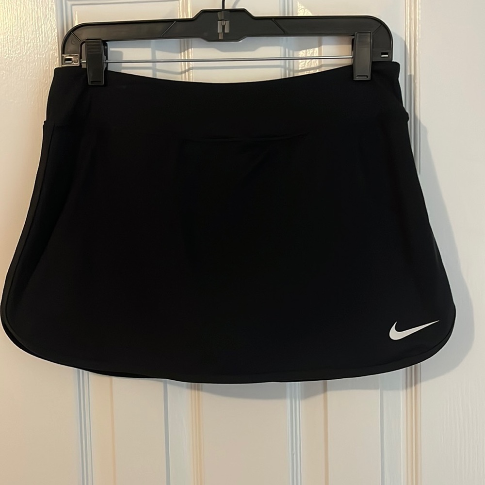 Nike women’s tennis or golf skirt size medium black